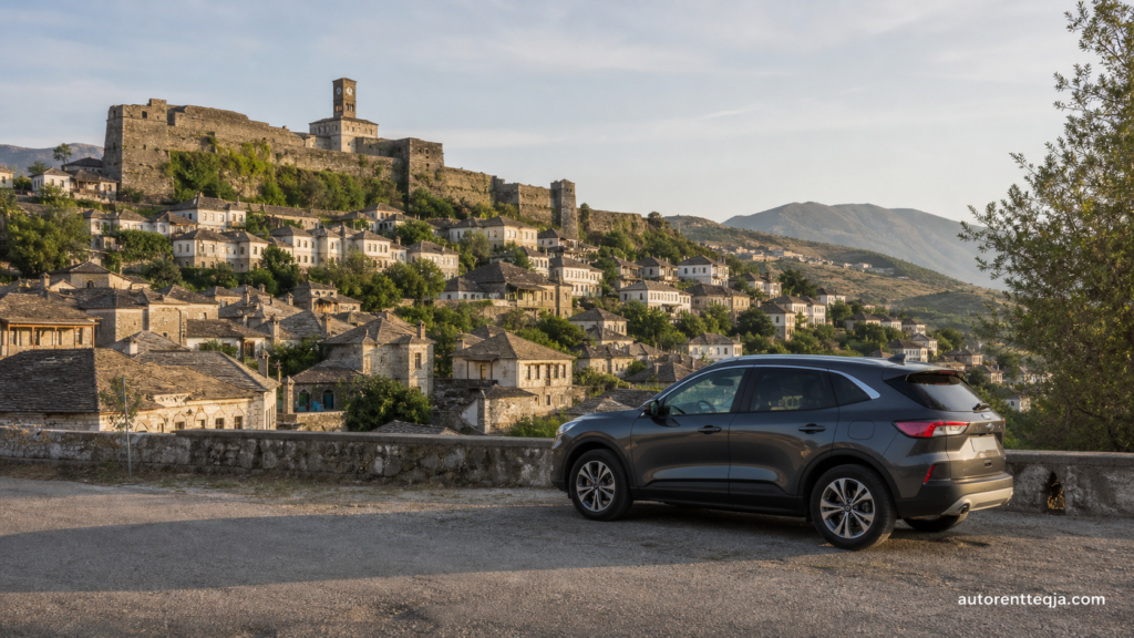 Rental SUV overlooking the stone city of Gjirokastër, Albania